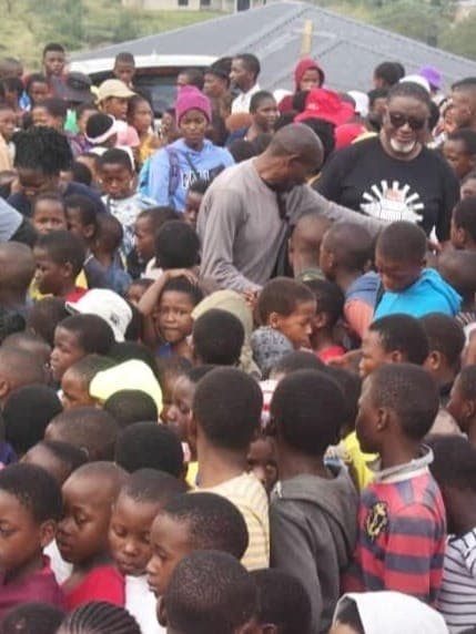 Outreach Day, we provide hot meals for over 500 children. food parcels, bread, cloths